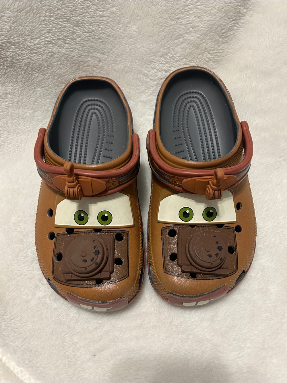 Disney Brown Mater Mens Character Croc Sandals with Green Eye Detail